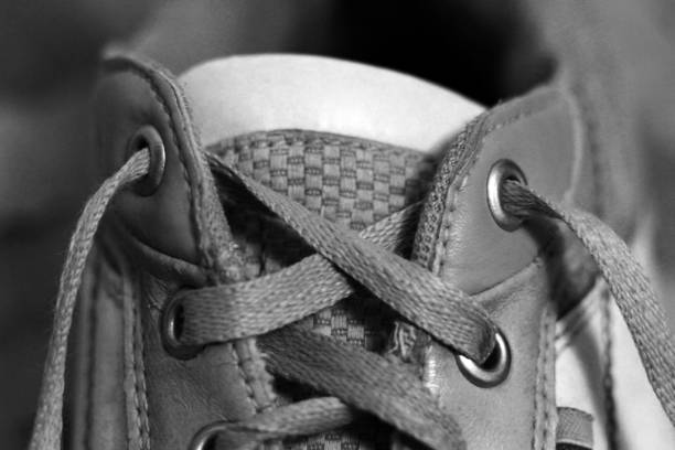 istock The laces on sneakers so close, black and white 1090413844