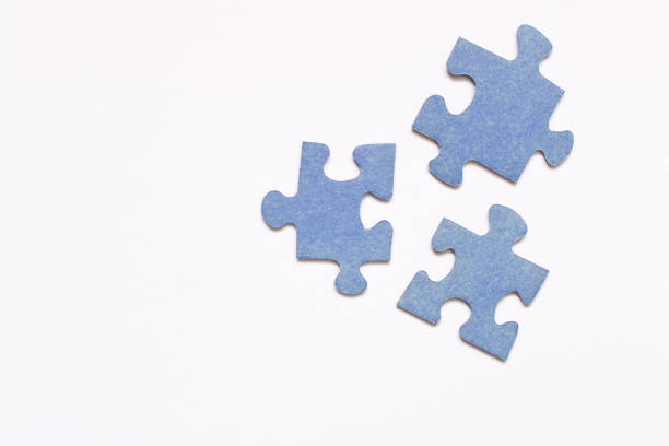 istock Several pieces of puzzles . Isolated on white background 1090416202