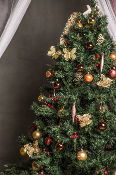 istock Christmas tree with beautiful ornaments on gray background 1090416924