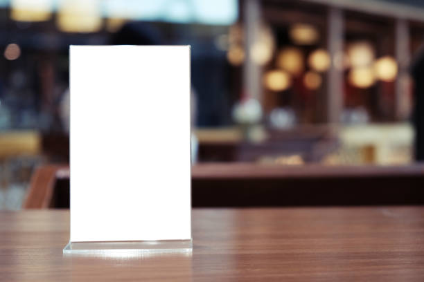 istock Menu frame standing on wood table in Bar restaurant cafe. space for text marketing promotion. 1090419182