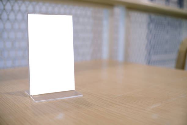 istock Menu frame standing on wood table in Bar restaurant cafe. space for text marketing promotion. 1090419242