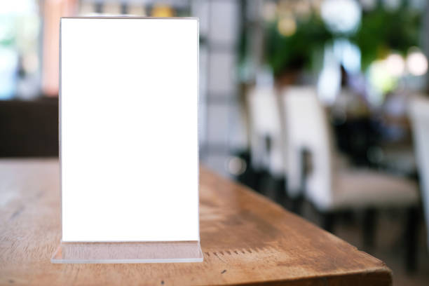 istock Menu frame standing on wood table in Bar restaurant cafe. space for text marketing promotion. 1090419246