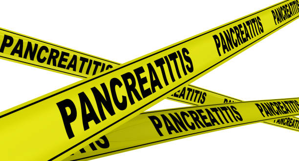 istock Pancreatitis. Yellow warning tapes 1090421798