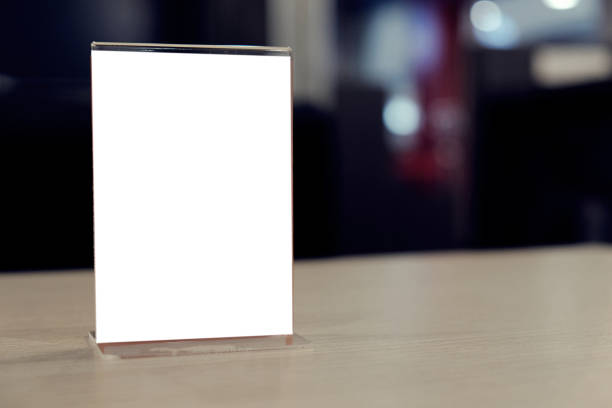 istock Menu frame standing on wood table in Bar restaurant cafe. space for text marketing promotion. 1090423844