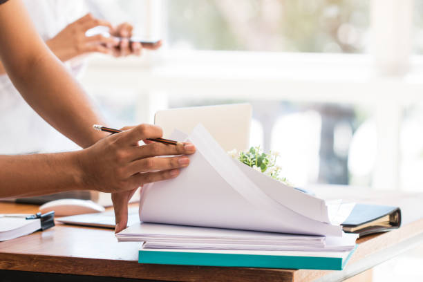 istock Co working team meeting concept: Asian Business people work and studying together with document notebook and papers in modern office, discuss finance /marketing solution reporting file in busy offices 1090426144