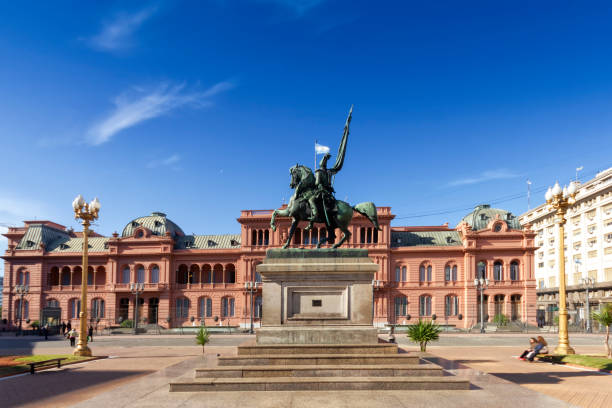 Plaza de Mayo and Casa Rosada Photo of Plaza de Mayo, at Buenos Aires, Argentina, The statue of General Manuel Belgrano and 'The Casa Rosada' are on background. casa stock pictures, royalty-free photos & images