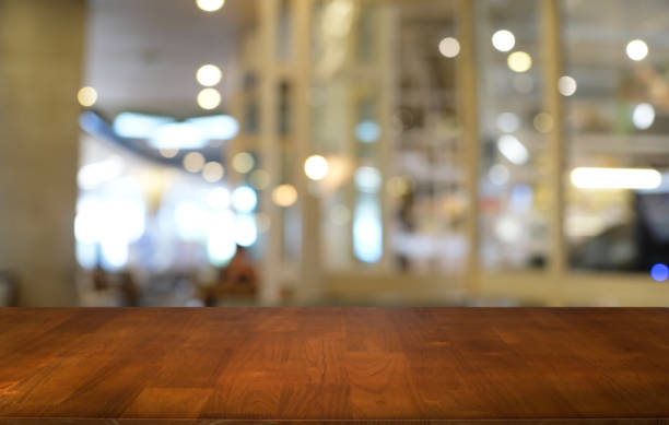 istock Empty dark wooden table in front of abstract blurred bokeh background of restaurant . can be used for display or montage your products.Mock up for space. 1090430954