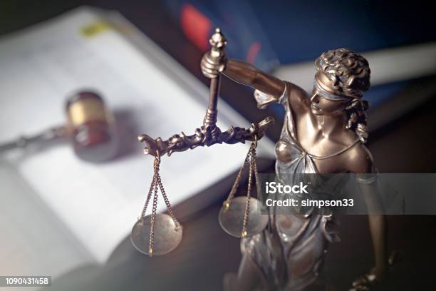 Statue Of Justice On Books Background Stock Photo - Download Image Now - Lawyer, Advice, Affidavit
