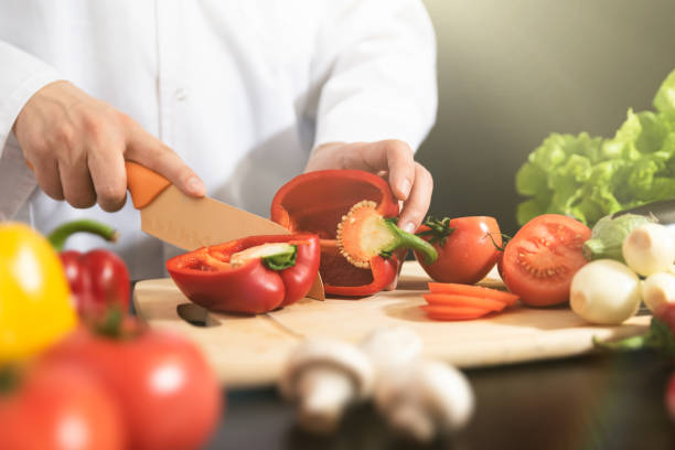 istock Chef prepares fresh vegetables. Healthy nutrition 1090432600