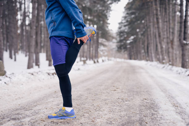istock Winter stretching outdoors 1090442708