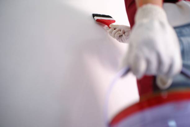 istock Room Painting Job painter man with roller. 1090442750