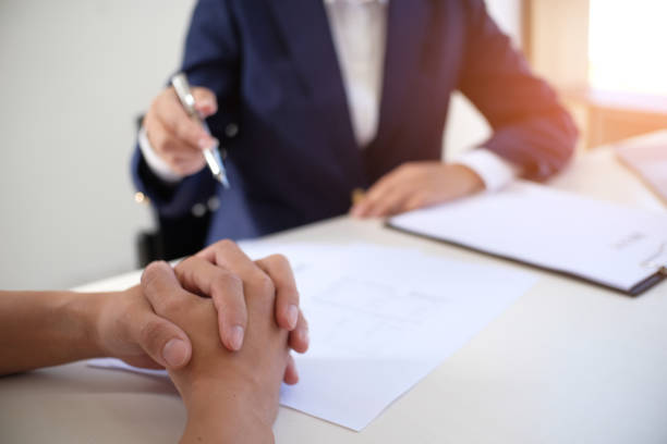 istock Sales manager giving advice application form document, considering mortgage loan offer for car and house insurance. 1090446020
