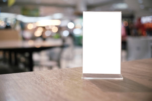 istock Menu frame standing on wood table in Bar restaurant cafe. space for text marketing promotion. 1090446120