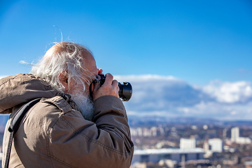 Senior Man Photographer with Ankara Ariel View