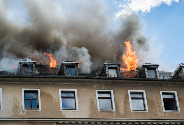 roof truss fire of a house - water cannon imagens e fotografias de stock