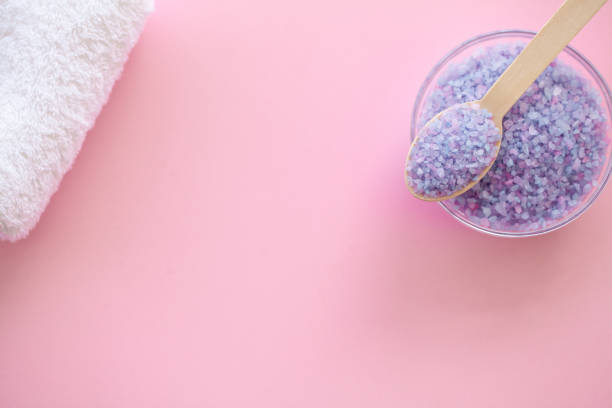 istock Spa. Bath Organic Salt on Wooden Spoon on Pink Background With Copy Space. 1090452138