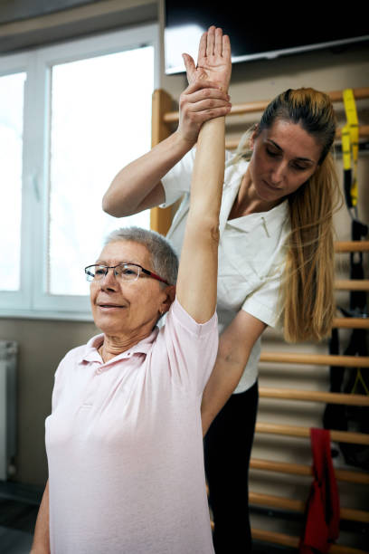 istock Senior Woman At Doctor's Office - Physio and Chiropractic 1090453294
