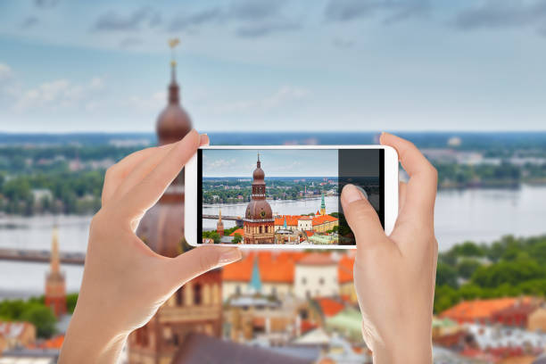 istock A man makes a photo of Riga 1090457456
