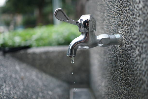 istock Faucet with water in the park. close up. 1090459320