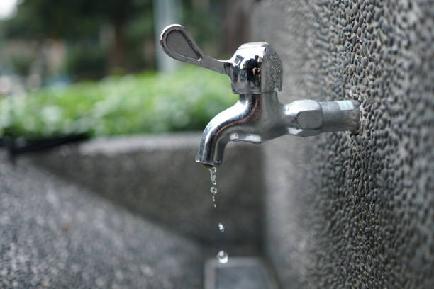 istock Faucet with water in the park. close up. 1090459454