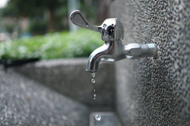 istock Faucet with water in the park. close up. 1090459510