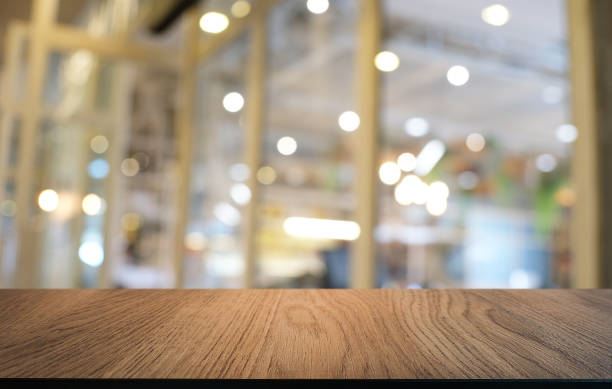 istock Empty dark wooden table in front of abstract blurred bokeh background of restaurant . can be used for display or montage your products.Mock up for space. 1090460274