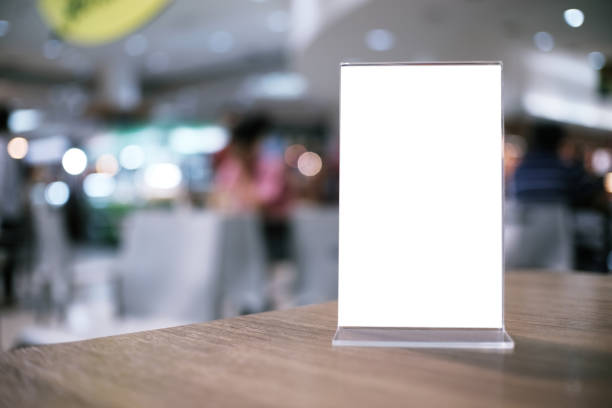 istock Menu frame standing on wood table in Bar restaurant cafe. space for text marketing promotion. 1090460290