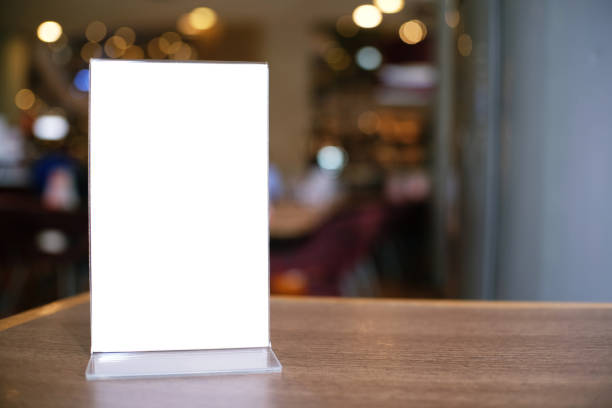istock Menu frame standing on wood table in Bar restaurant cafe. space for text marketing promotion. 1090460452