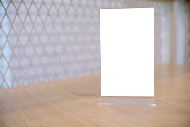istock Menu frame standing on wood table in Bar restaurant cafe. space for text marketing promotion. 1090460460