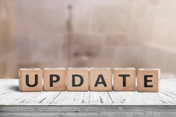 istock Update message sign on a wooden desk in a room 1090465632
