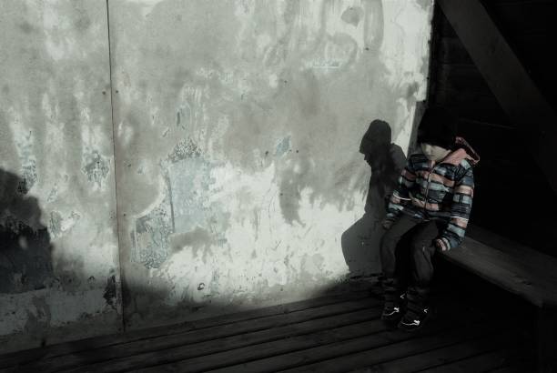 istock The boy at the bus stop 1090467496