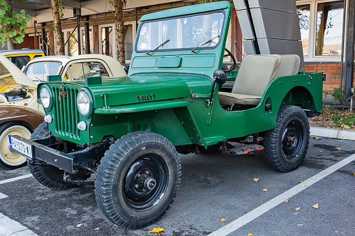 Belgrade, Serbia-October 13, 2018: An oldtimer exhibition in the parking lot in front of the Rakovica Municipality in Belgrade, Serbia. Willys MB Jeep  U.S. Army Truck.