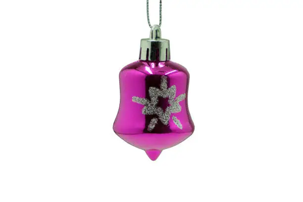 Photo of Pink ornament with bronze string .