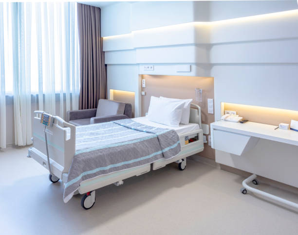 istock Hospital room with beds and comfortable medical equipped 1090482448