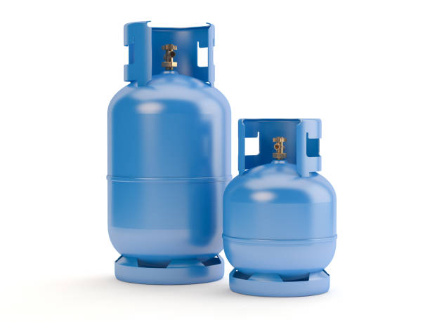 dos botellas de gas azul - liquid propane gas fotografías e imágenes de stock