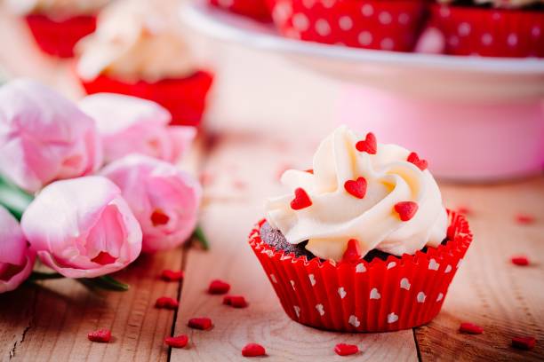 istock Chocolate cupcakes with vanilla cream and red sugar hearts for Valentine's Day 1090487630
