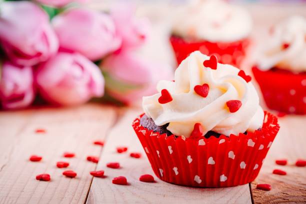 istock Chocolate cupcakes with vanilla cream and red sugar hearts for Valentine's Day 1090487904