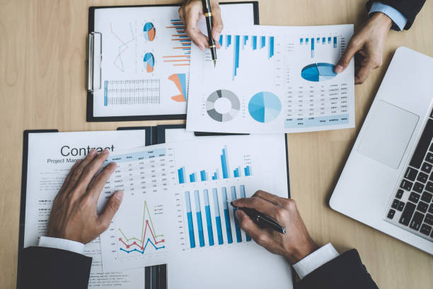 istock Finance manager meeting discussing company growth project success financial statistics, professional investor working start up project for strategy plan with document, laptop and digital tablet 1090491708