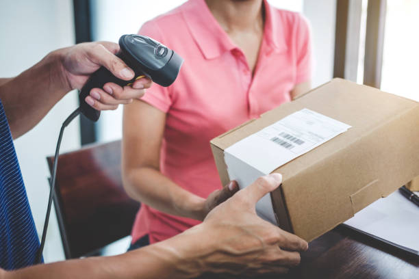 istock Home delivery service and working service mind, deliveryman working barcode scan to confirm sending customer in post office 1090495354