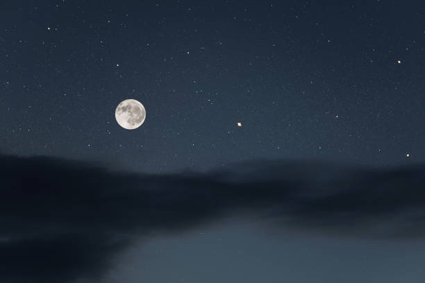 istock Huge full moon on the night sky with bright stars 1090495906