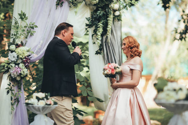 istock bride and groom on wedding ceremony on background nature 1090498484
