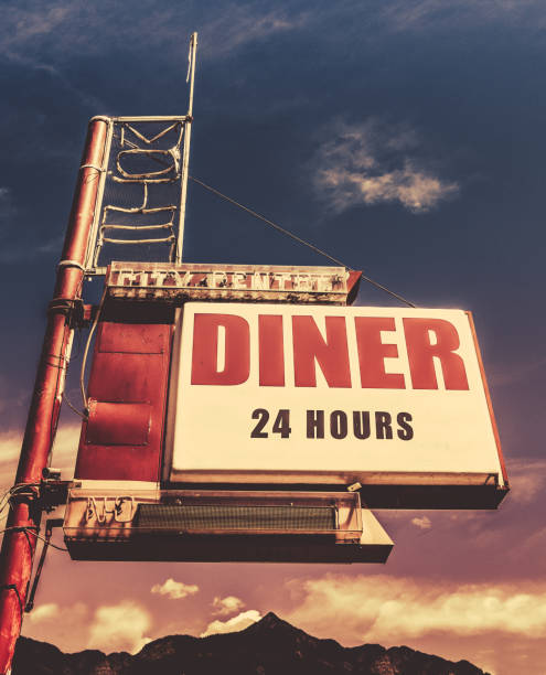 Auburn, NY, USA -- 1990: Hunter Diner in Auburn, over the Owwasco Lake outlet on Genesee Street, before it was moved in Septermber 2023