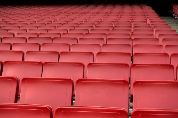 istock Red seat row in stadium 1090500086