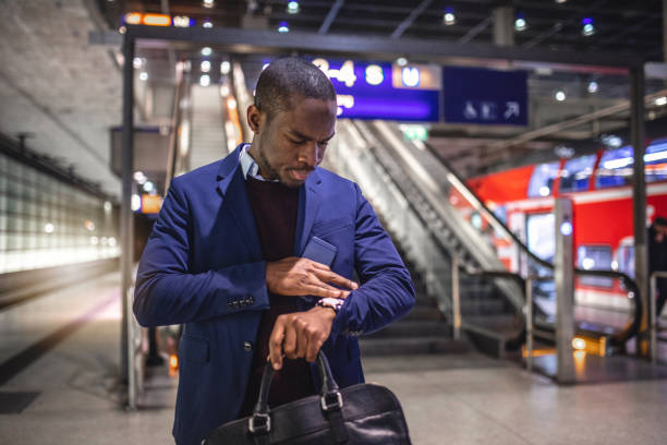 istock Modern businessman in a suit nervously waiting for his ride to work 1090500546