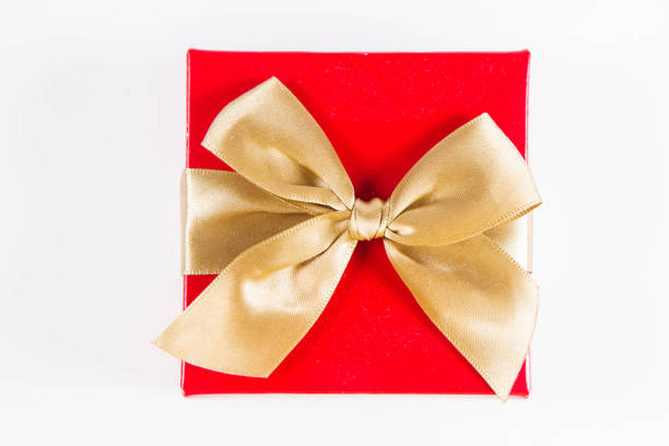 istock Wrapped gift with a golden ribbon 1090502594