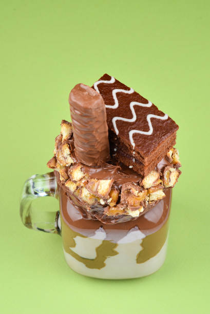 istock Chocolate extreme milkshake with brownie cake, chocolate paste and sweets. Crazy freakshake food trend. Copy space 1090503170