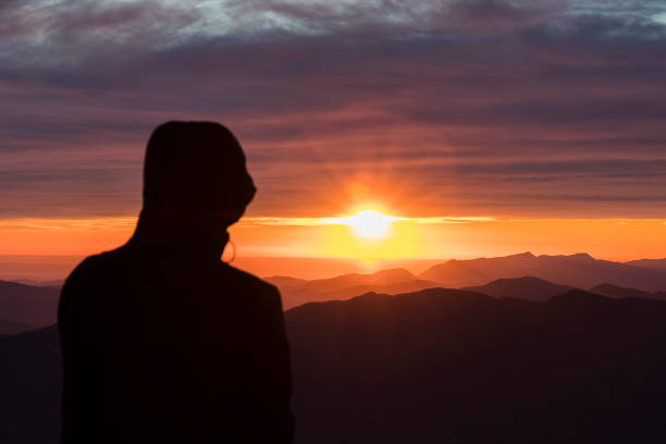 istock Watching the sunset from the mountain 1090504392