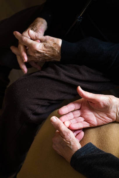 istock Hands of two old women 1090511974