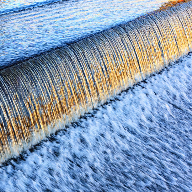 istock Lake Placid New York Golden Sunlight Evening Waterfall 1090517952