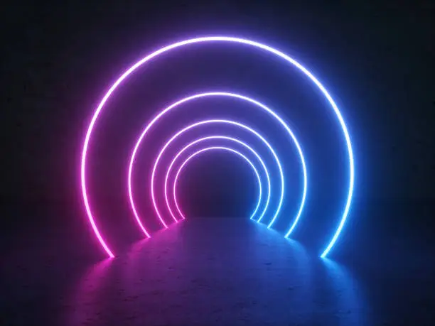 Photo of Neon Glowing Circle Round Shape Tubes On Reflection Concrete Floor